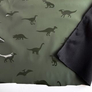 Tkanina za kabanice Dinosaurs dark green