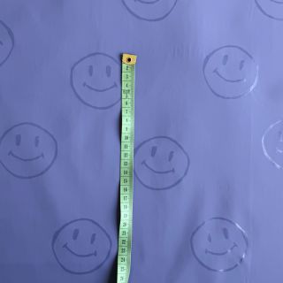 Tkanina za kabanice Happy faces purple